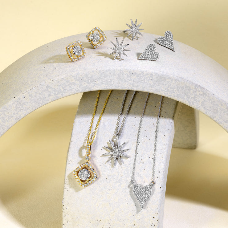 14K Yellow Gold 0.50ct Round Diamond Halo Clover Shape Necklace. Matching earrings available. Bichsel Jewelry in Sedalia, MO. Shop online or in-store today! 