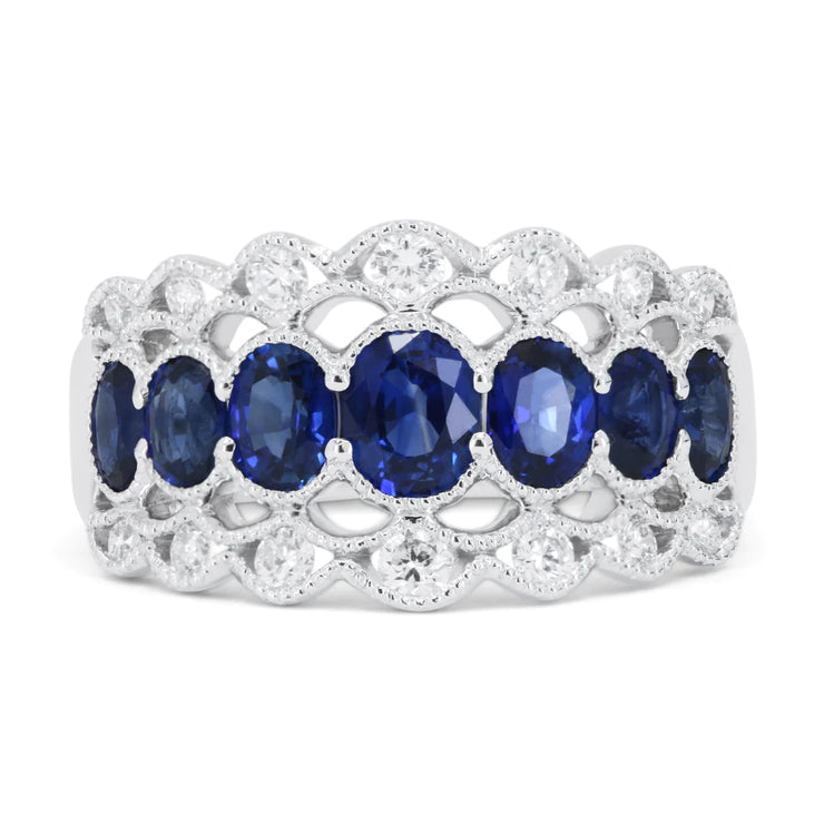 18K White Gold Vintage-Style 1.80ct Oval Blue Sapphire & 0.31ct Round Diamond Ring. Bichsel Jewelry in Sedalia, MO. Shop gemstone rings online or in-store today!
