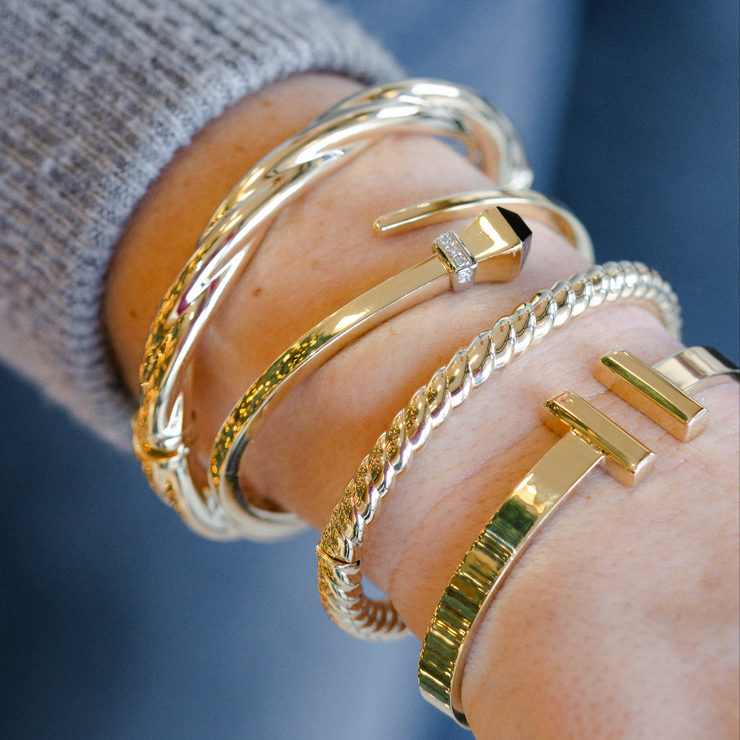 14K Polished Yellow Gold Wrap Bangle with Black Onyx & Diamond Accents. Bichsel Jewelry in Sedalia, MO. Shop bracelet styles online or in-store today!