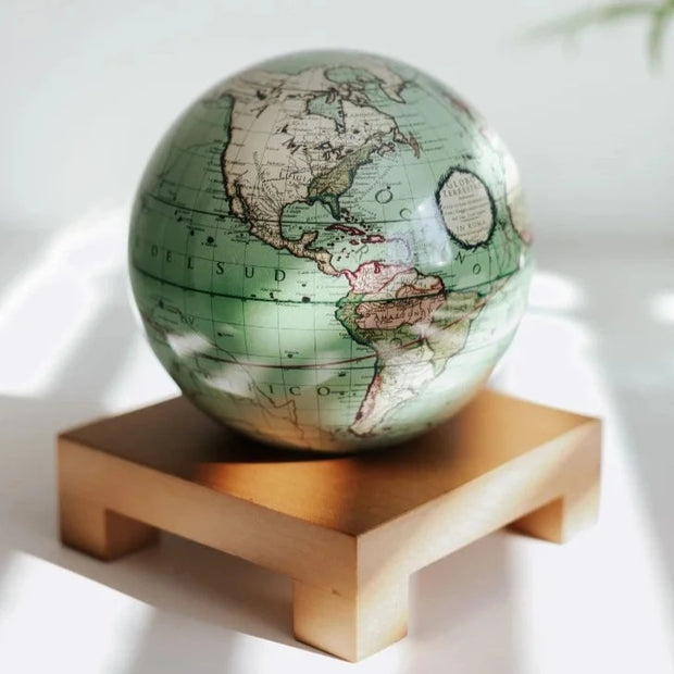 6" Antique Terrestrial Green MOVA Globe with Acrylic Base. 1790 World Map. Powered by Solar Ambient Light & Magnets. No cords or batteries needed. Shop online or in-store today! Bichsel Jewelry | Sedalia, MO
