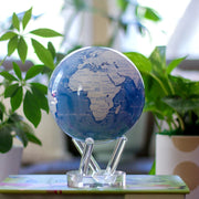 6" Sky Blue and White MOVA Globe with Acrylic Base. Powered by Solar Ambient Light & Magnets. No cords or batteries needed. Shop online or in-store today!