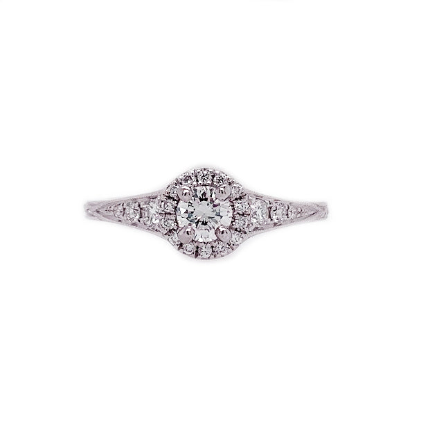 14K White Gold 0.25ct Round Vintage-Inspired Diamond Ring with 0.20ct Halo & Accent Diamonds. Bichsel Jewelry in Sedalia, MO. Shop online or in-store today!