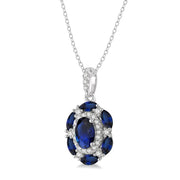 14K White Gold Oval Sapphire Pendant with Marquise Sapphires and Round Diamonds. Bichsel Jewelry in Sedalia, MO. Shop online or in-store today!