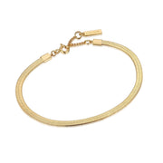 Ania Haie Gold Herringbone Chain Bracelet, 925 sterling silver with 14K yellow gold plating. Bichsel Jewelry in Sedalia, MO. Shop styles online or in-store today!