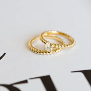 Gold round diamond engagement ring at Bichsel Jewelry in Sedalia, MO