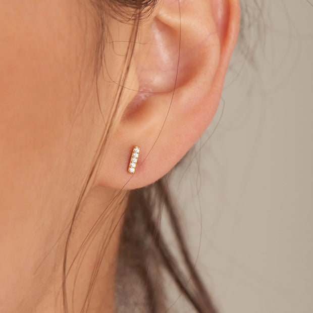  Ania Haie Glam Bar Studs, 14K Yellow Gold plated on 925 Sterling Silver with CZ Stones. Bichsel Jewelry in Sedalia, MO. Shop online or in-store today!
