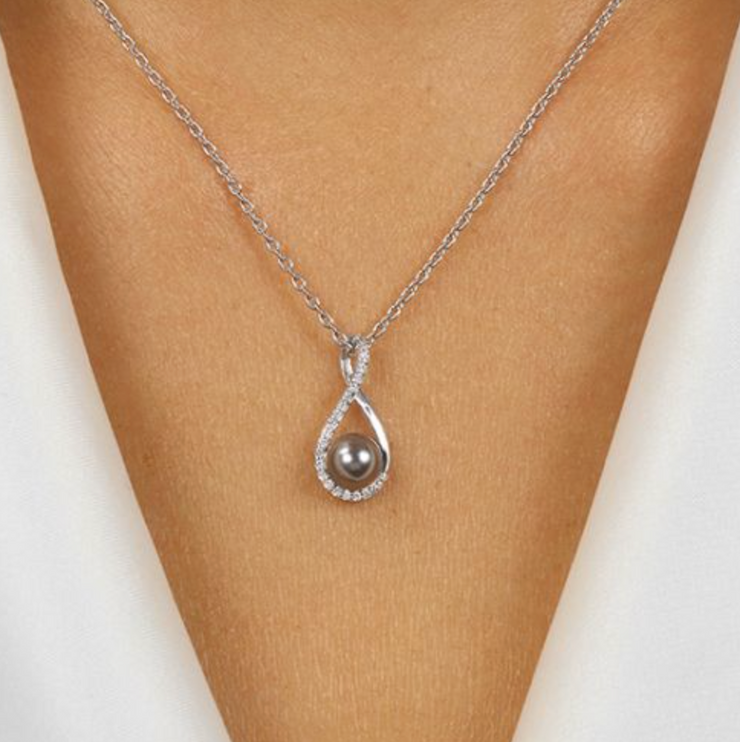 Sterling Silver Black Pearl Pendant with Cubic Zirconia stones. Bichsel Jewelry in Sedalia, MO. Shop pearl styles online or in-store today!